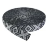 Close-up of black and white custom jacquard tapes with different patterns being used as decorative trims on a navy jacket seam and a white hoody cuff.