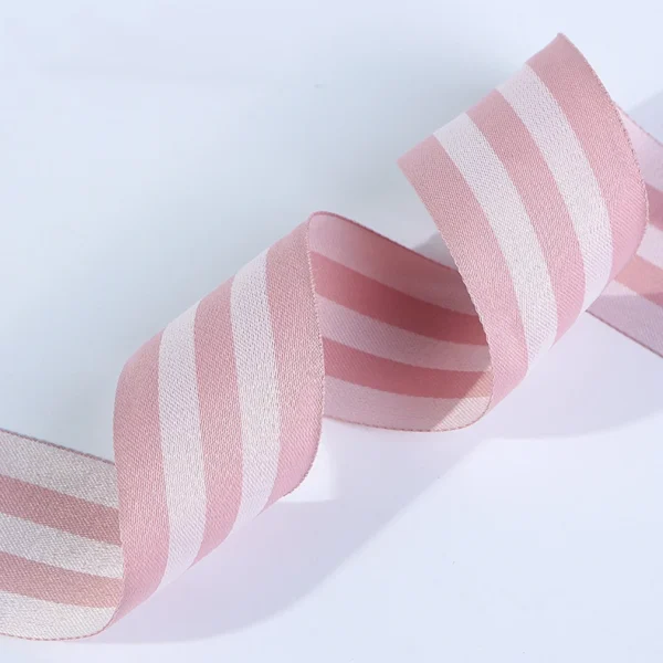 Roll of GRS and OEKO-TEX certified recycled polyester jacquard webbing manufactured for eco brands